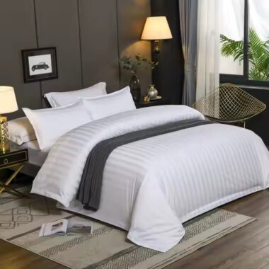 White down duvet bedding set styled in luxury hotel room for premium comfort