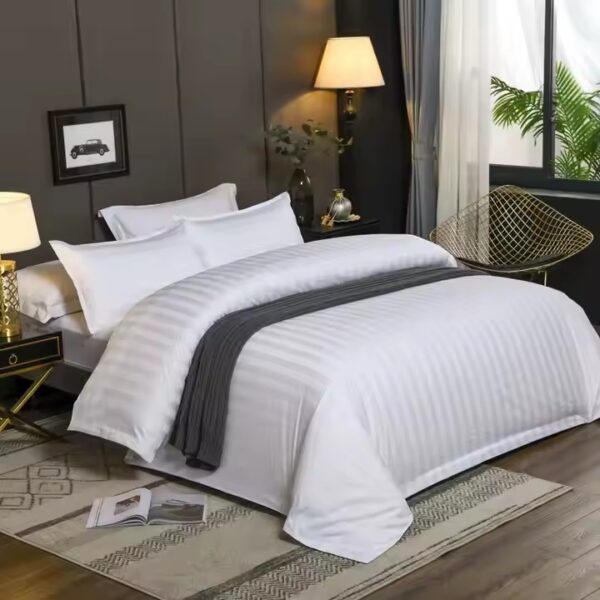 White down duvet bedding set styled in luxury hotel room for premium comfort