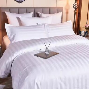 White down duvet bedding set styled in luxury hotel room for premium comfort