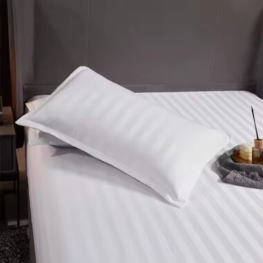 White down duvet bedding set styled in luxury hotel room for premium comfort