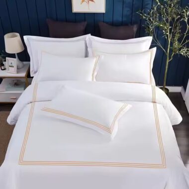 Luxury 100% cotton embroidered hotel bedding set with down filling for high-end hospitality