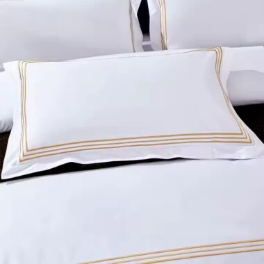 Luxury 100% cotton embroidered hotel bedding set with down filling for high-end hospitality