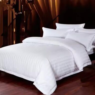 Premium white cotton hotel bedding set for five-star hotels, available in wholesale bulk