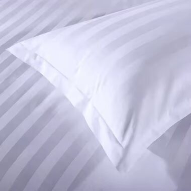 Premium white cotton hotel bedding set for five-star hotels, available in wholesale bulk