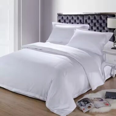 Premium white cotton hotel bedding set for five-star hotels, available in wholesale bulk