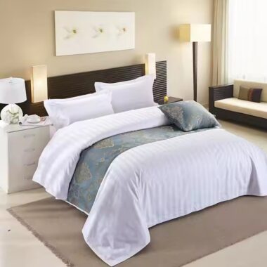 Premium white cotton hotel bedding set for five-star hotels, available in wholesale bulk