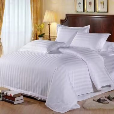 Premium white cotton hotel bedding set for five-star hotels, available in wholesale bulk