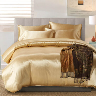 Luxury oversized silk hotel bedding set with smooth elegant drape