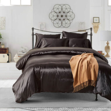 Luxury oversized silk hotel bedding set with smooth elegant drape