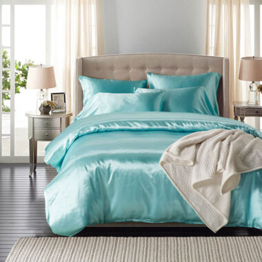 Luxury oversized silk hotel bedding set with smooth elegant drape