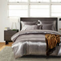 Luxury oversized silk hotel bedding set with smooth elegant drape