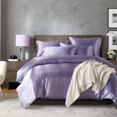 Luxury oversized silk hotel bedding set with smooth elegant drape