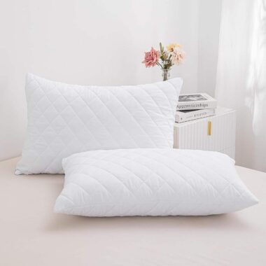 Soft white hotel pillow and pillowcase for hospitality rooms